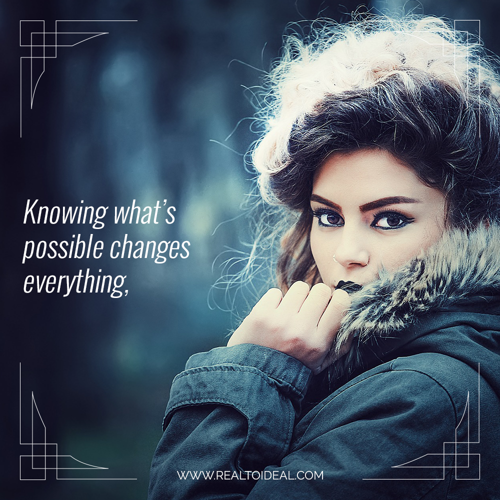 young woman in a winter coat with her left hand on the fur trimmed hood pulling it close to her neck, looking at the camera with thick blue eyeliner and dark blue lipstick and the words: Knowing what's possible changes everything, typed in white letters on the left side of the image