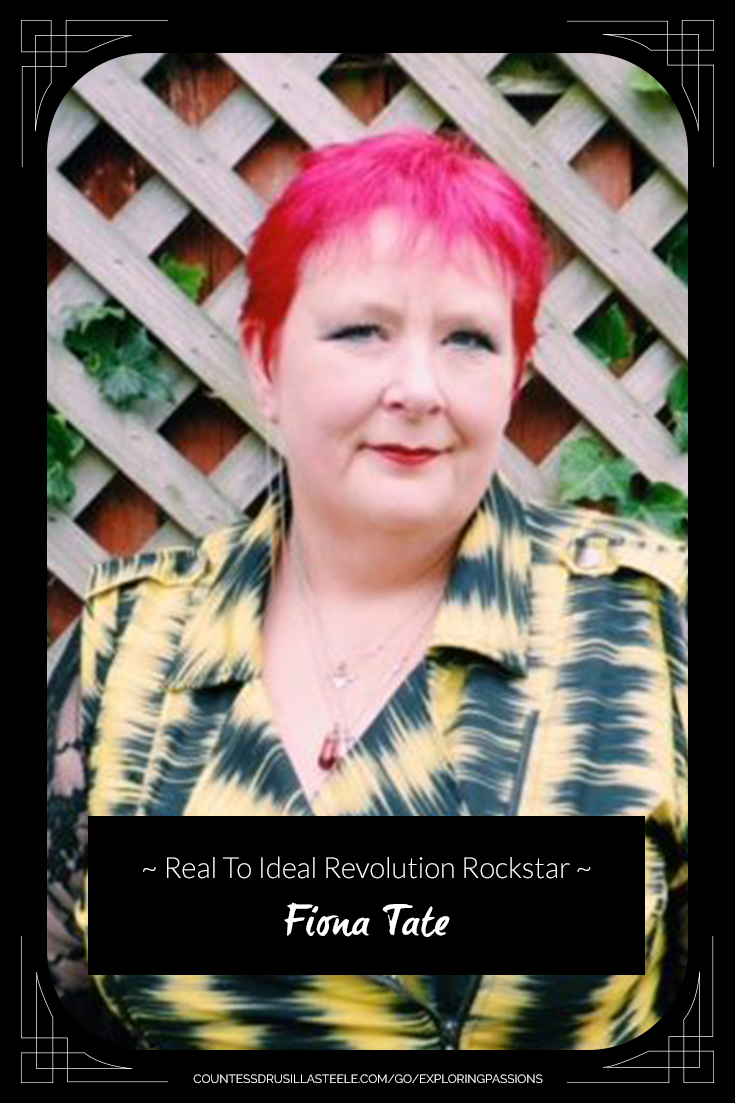 Photo of Fiona Tate, looking beautiful in red hair and a yellow shirt, with the words Real To Ideal Revolution Rockstar on a black background.